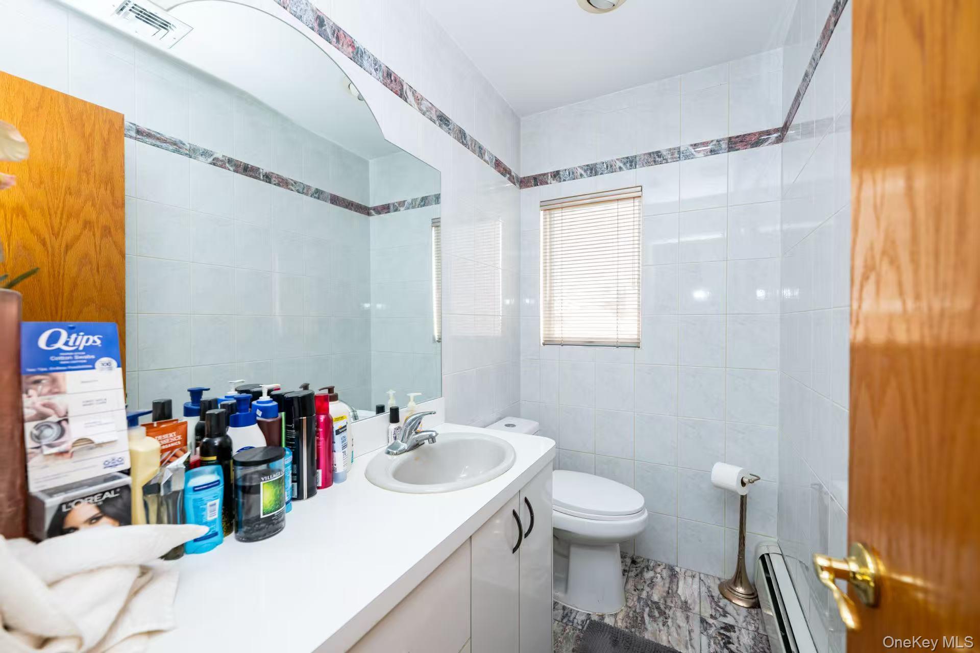 216-43 28th Road Queens, NY 11360 - Photo 7 of 24