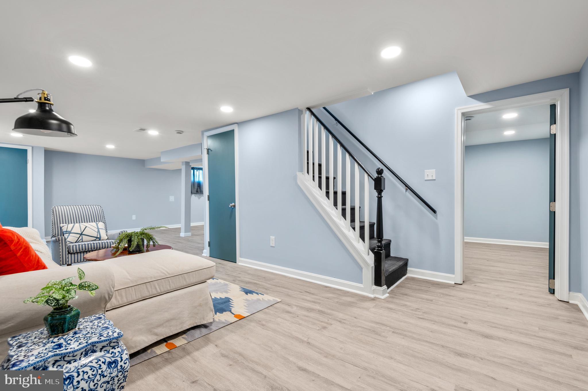 1217 64th Street Rosedale, MD 21237 - Photo 24 of 49 Lower Level Family Room and Den in Background