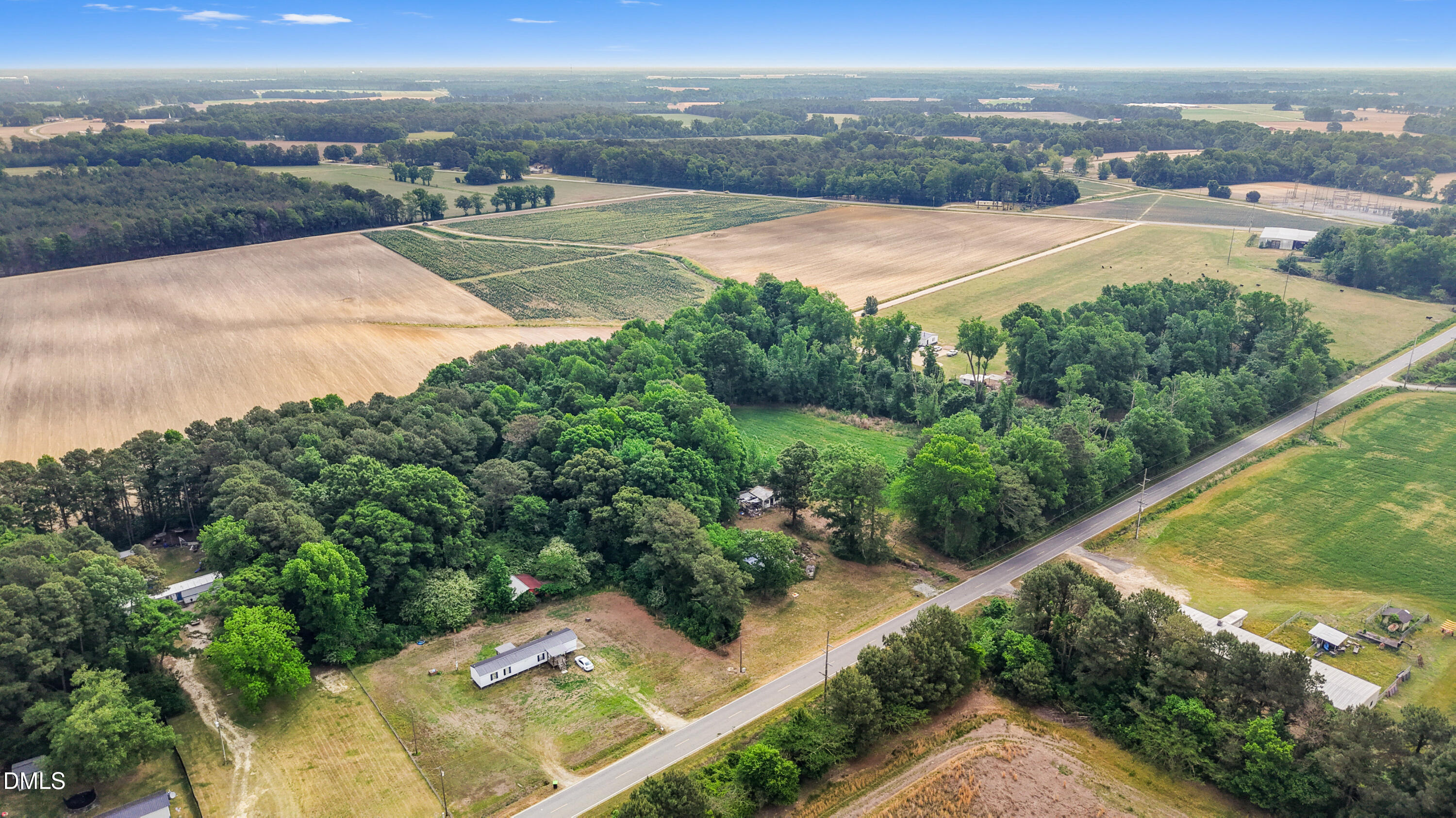 3237 East Darden Road Faison, NC 28341 - Photo 7 of 9 an aerial view of residential houses with outdoor space