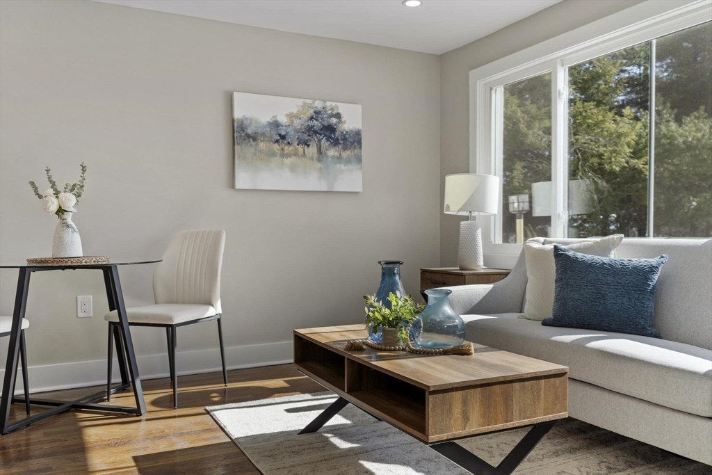 68 East Street Hanover, MA 02339 - Photo 11 of 39 a living room with furniture and a large window