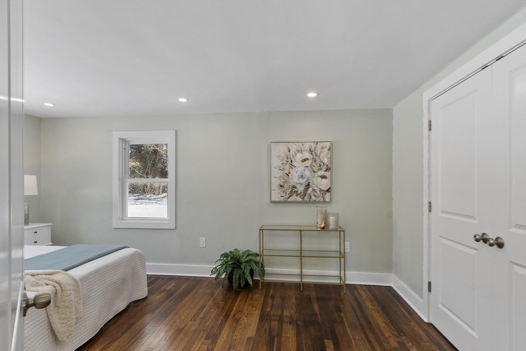 68 East Street Hanover, MA 02339 - Photo 29 of 39 a living room with furniture and a wooden floor