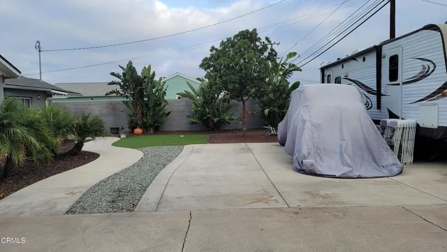 a view of street with parked cars