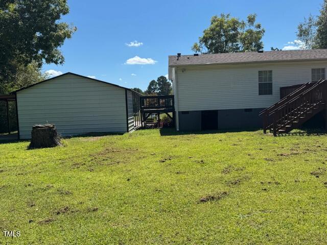 1302 Rocky Ford Road Louisburg, NC 27549 - Photo 11 of 26 a view of a backyard of the house