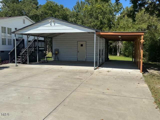 1302 Rocky Ford Road Louisburg, NC 27549 - Photo 13 of 26 a front view of a house with garden