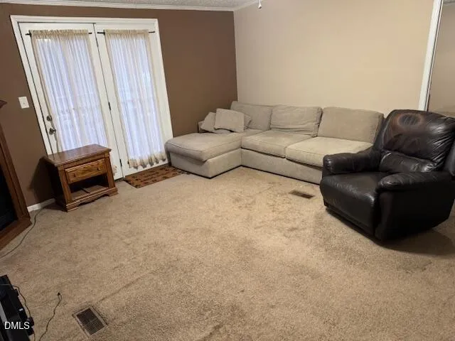 a living room with furniture and a couch