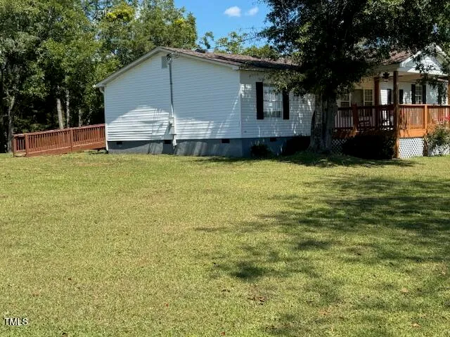 a house view with a garden space