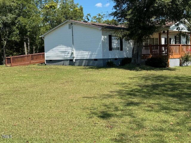 1302 Rocky Ford Road Louisburg, NC 27549 - Photo 5 of 26 a house view with a garden space