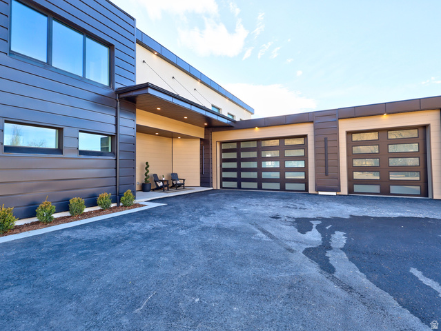 1306 East Victor Lane Draper, UT 84020 - Photo 6 of 60 Garage featuring driveway