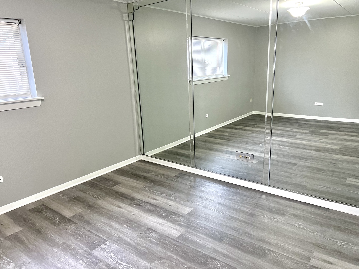 3133 Bernice Road, Unit 2 Lansing, IL 60438 - Photo 7 of 9 a view of a room with wooden floor