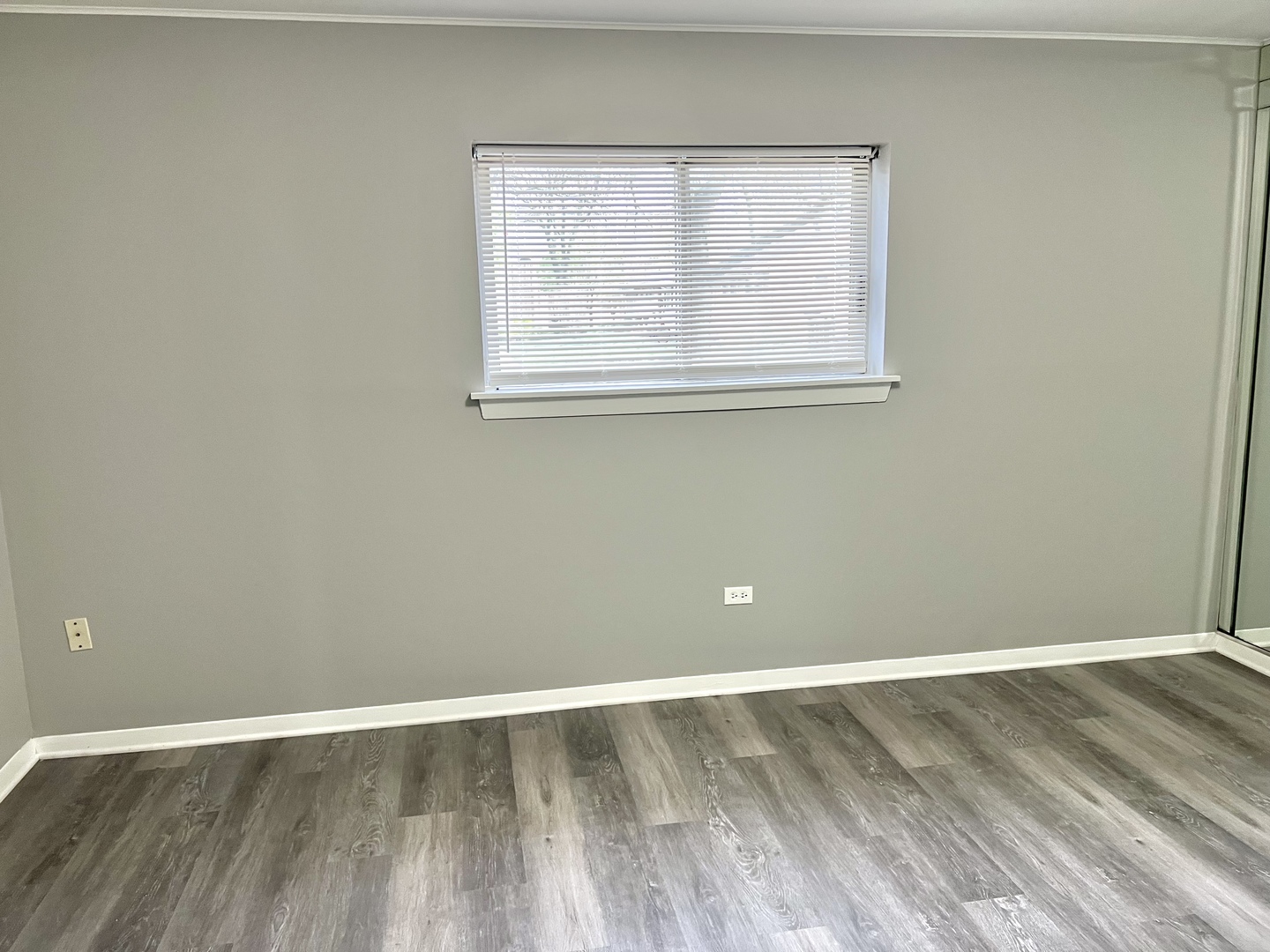 3133 Bernice Road, Unit 2 Lansing, IL 60438 - Photo 8 of 9 a view of a room with wooden floor and windows