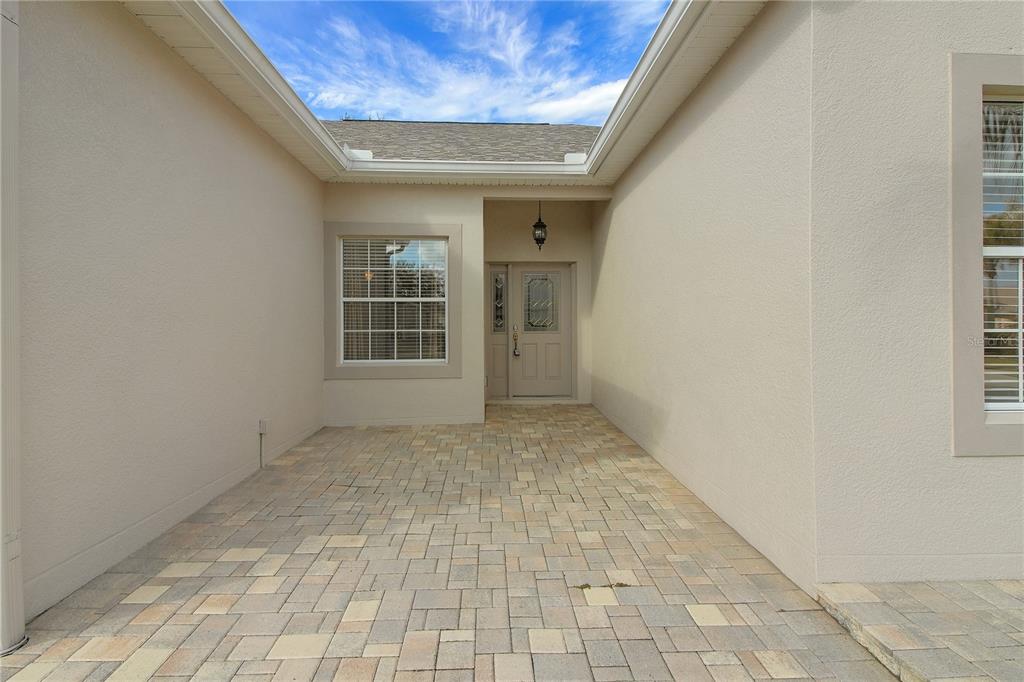 3715 Mulberry Grove Loop Leesburg, FL 34748 - Photo 3 of 48 an empty room with windows