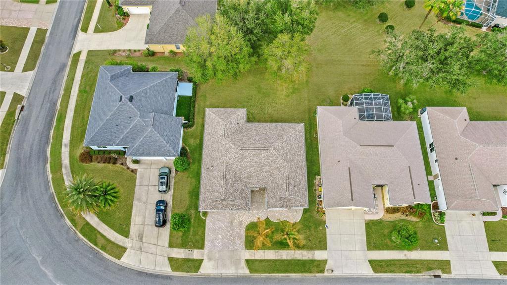 3715 Mulberry Grove Loop Leesburg, FL 34748 - Photo 48 of 48 an aerial view of a house with a swimming pool