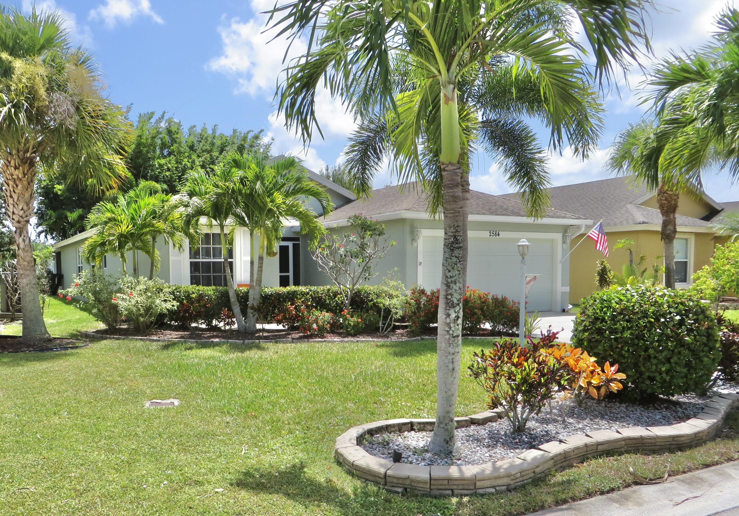 2584 Southwest Impala Way Stuart, FL 34997 - Photo 1 of 72 Front of home