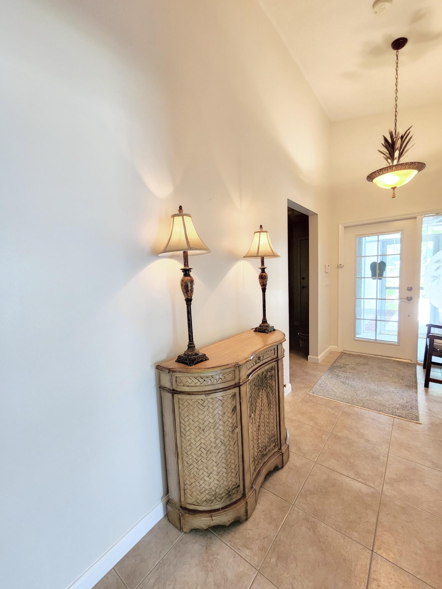 2584 Southwest Impala Way Stuart, FL 34997 - Photo 33 of 72 Entrance hallway