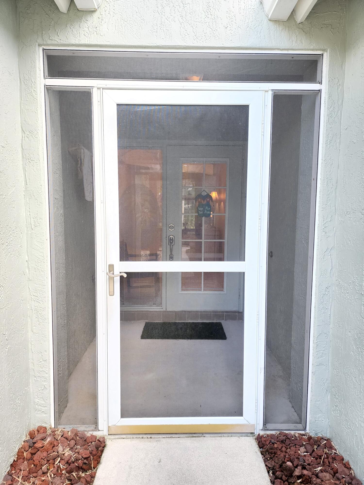 2584 Southwest Impala Way Stuart, FL 34997 - Photo 4 of 72 Front Door