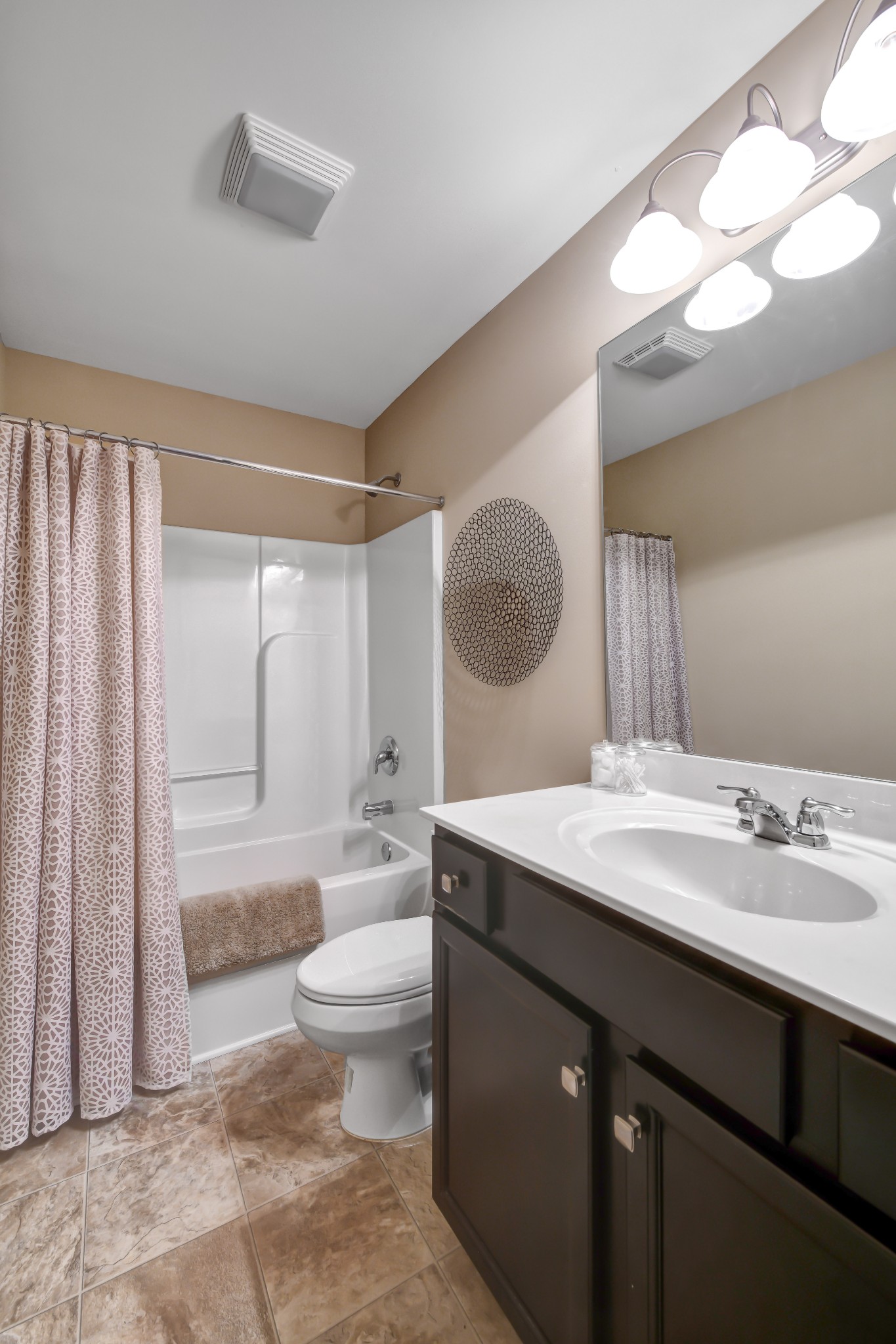 305 Windgrove Terrace Mount Juliet, TN 37122 - Photo 13 of 20 a spacious bathroom with a granite countertop sink a toilet a mirror and a shower