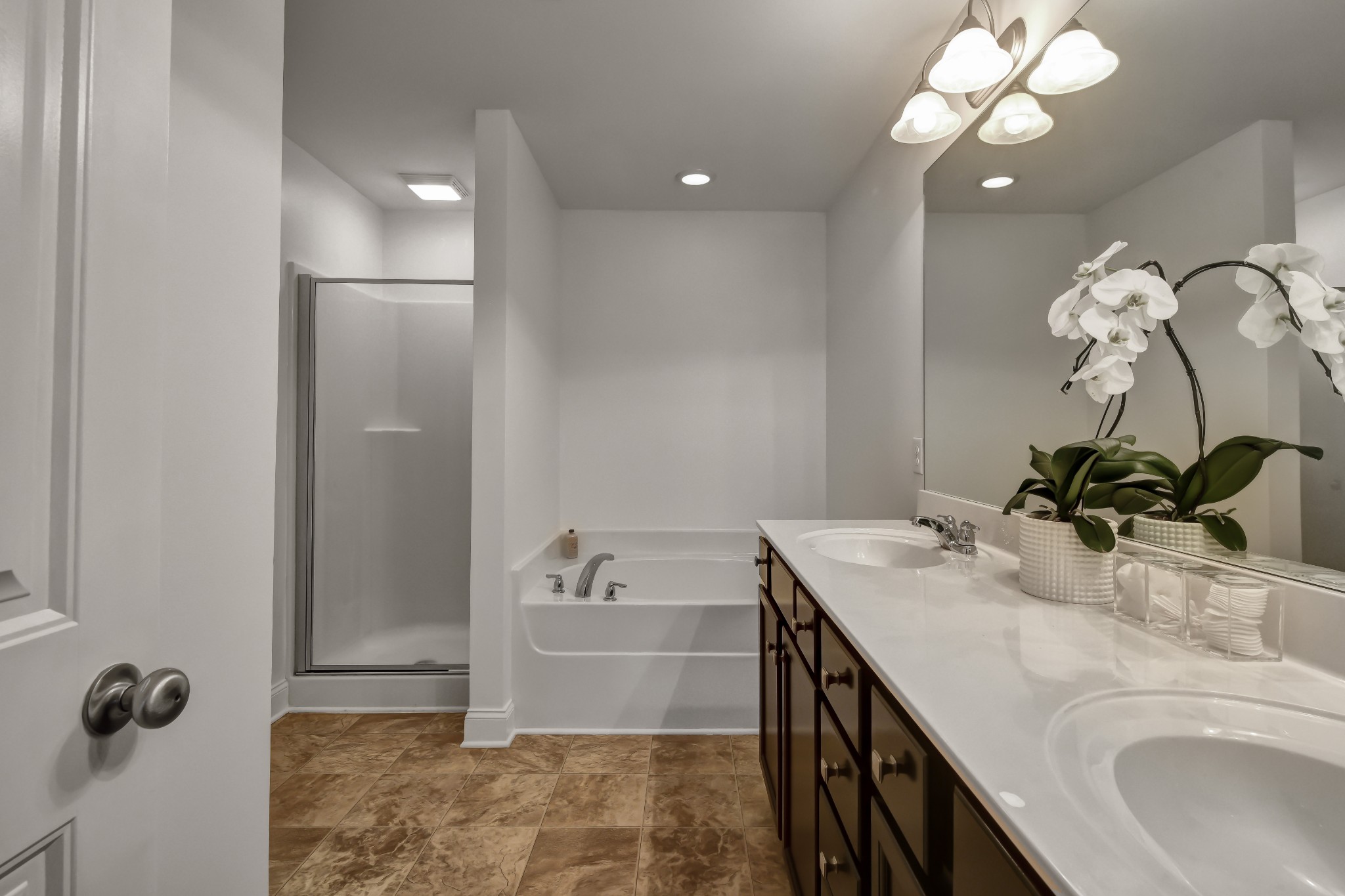 305 Windgrove Terrace Mount Juliet, TN 37122 - Photo 16 of 20 a bathroom with a sink a vanity and a mirror