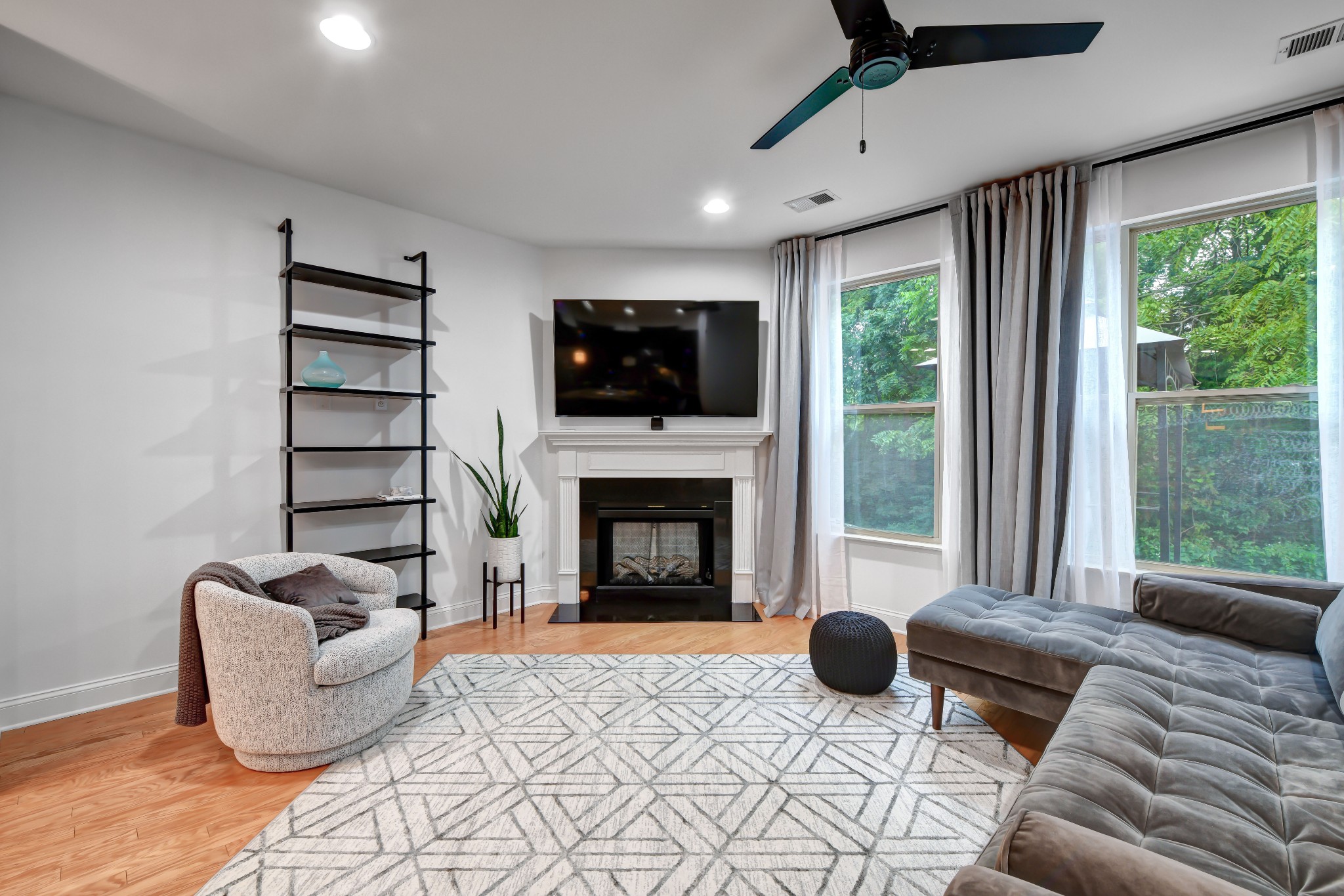 305 Windgrove Terrace Mount Juliet, TN 37122 - Photo 4 of 20 a bedroom with furniture and a fireplace
