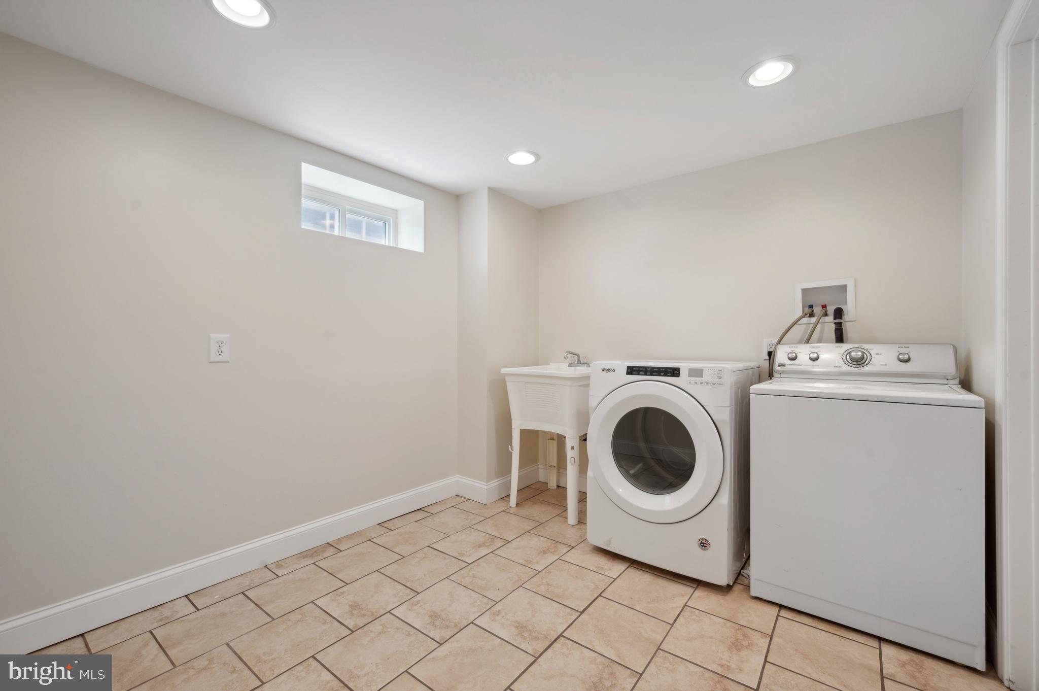 2426 Mill Road Upper Chichester, PA 19061 - Photo 23 of 24 Basement Laundry Room