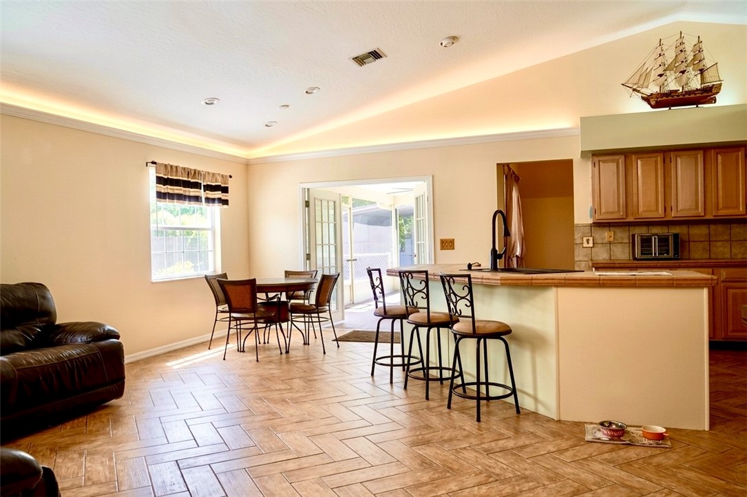686 Caravan Terrace Sebastian, FL 32958 - Photo 14 of 24 a dining room with furniture and a window
