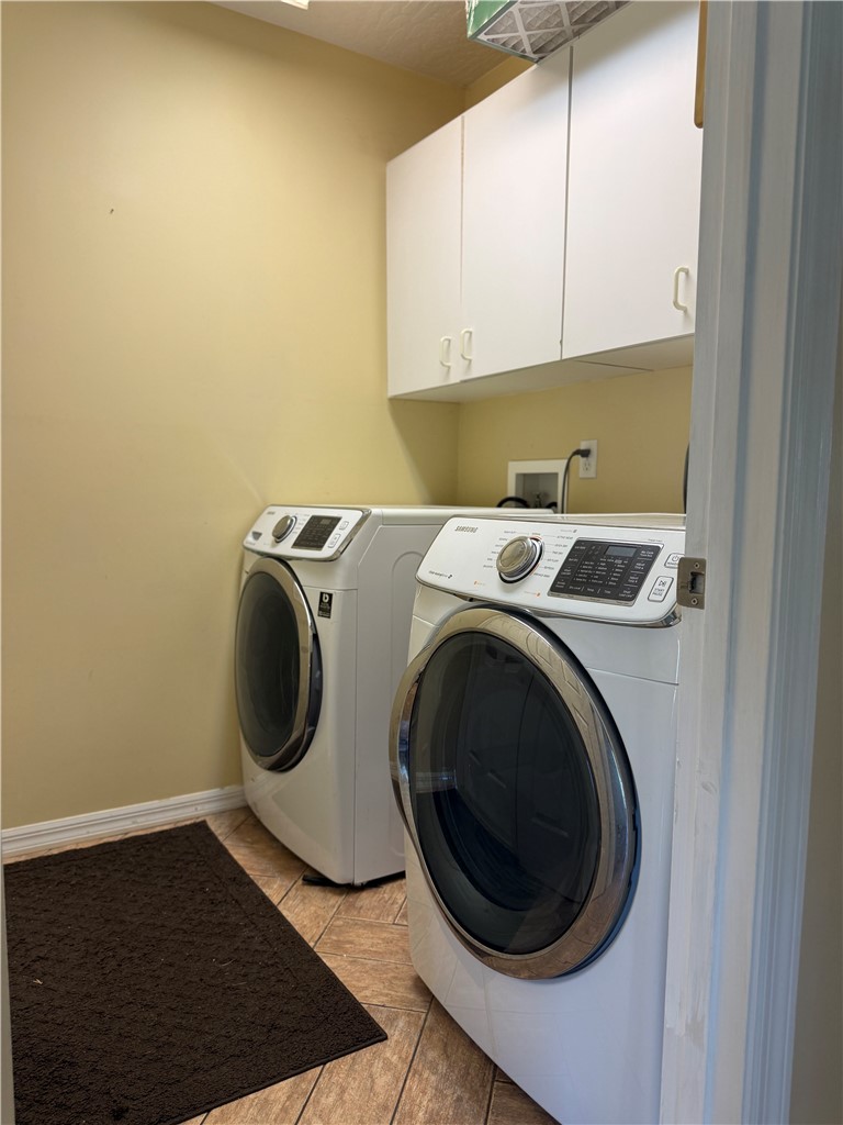 686 Caravan Terrace Sebastian, FL 32958 - Photo 9 of 24 a utility room with dryer and washer