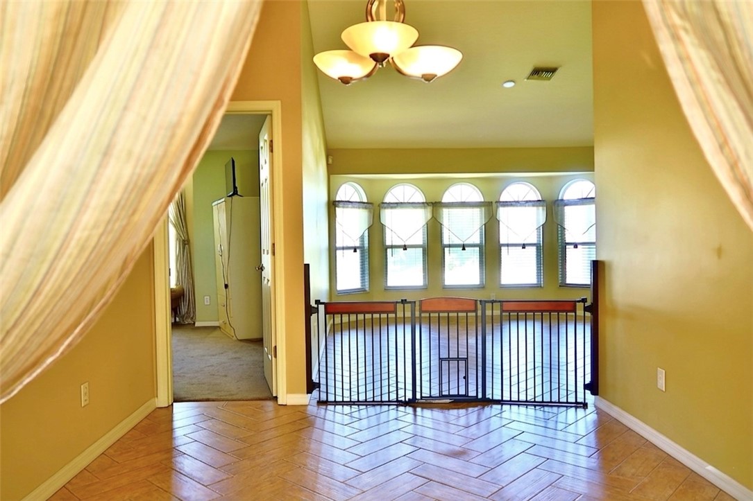 686 Caravan Terrace Sebastian, FL 32958 - Photo 10 of 24 a view of a balcony with wooden floor