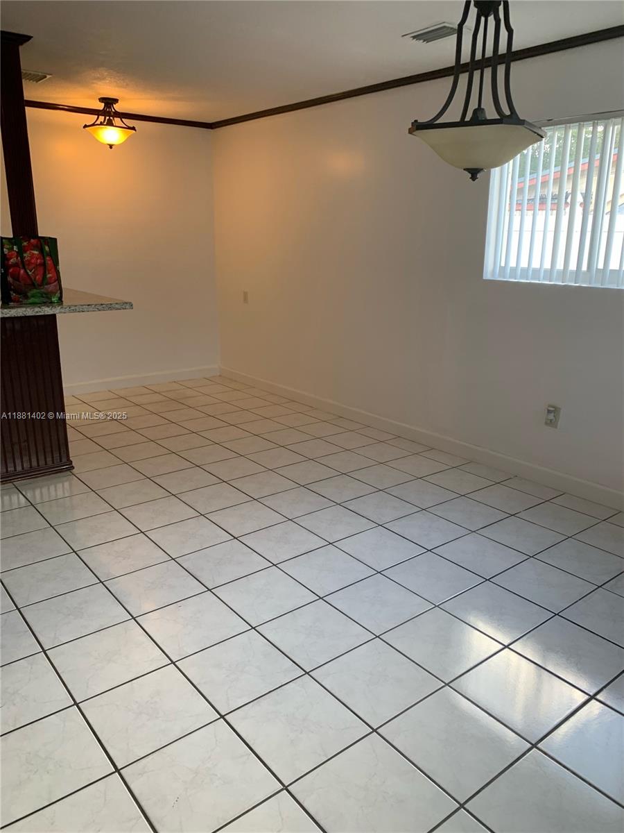 6180 Southwest 42nd Court Davie, FL 33314 - Photo 21 of 25 a view of a room and window