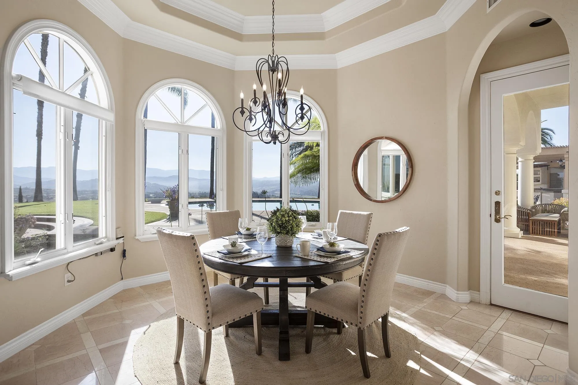 4 Rollingview Lane Fallbrook, CA 92028 - Photo 13 of 32 a dining room with furniture a chandelier and a rug