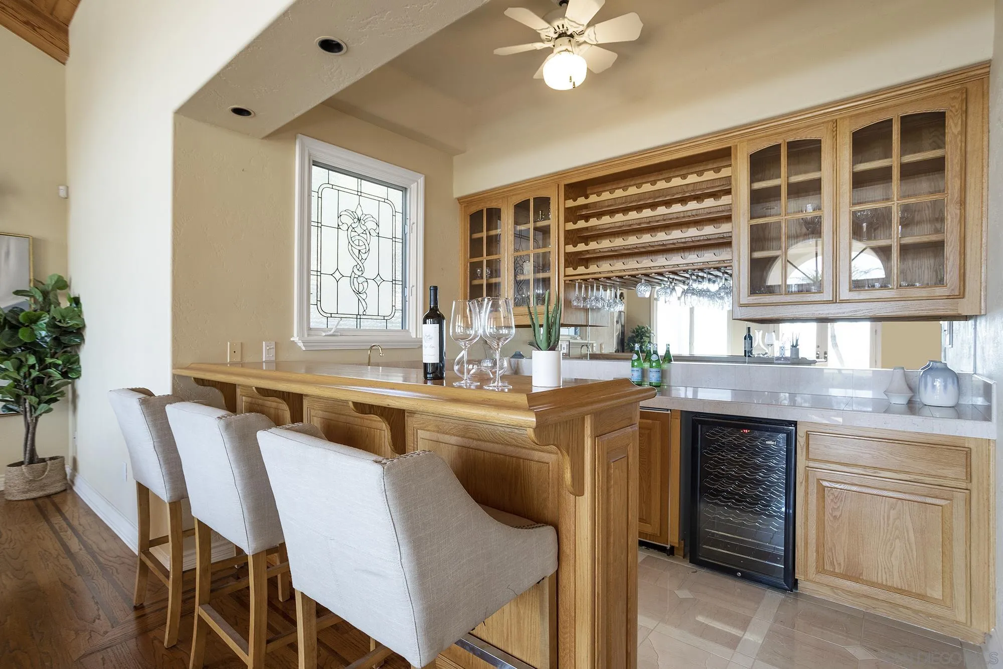4 Rollingview Lane Fallbrook, CA 92028 - Photo 18 of 32 a kitchen with a window dining table and chairs