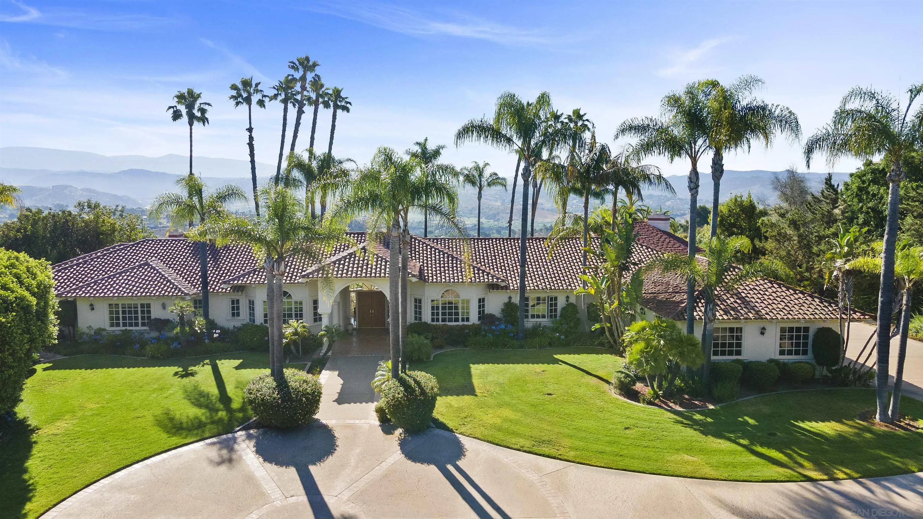 4 Rollingview Lane Fallbrook, CA 92028 - Photo 2 of 32 a view of a house with a yard and potted plants