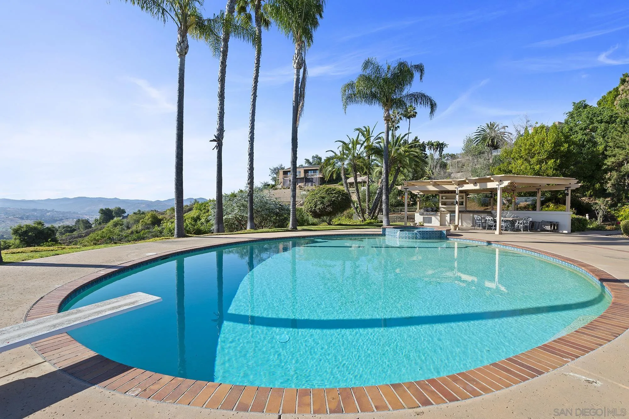 4 Rollingview Lane Fallbrook, CA 92028 - Photo 24 of 32 a view of a swimming pool with a balcony