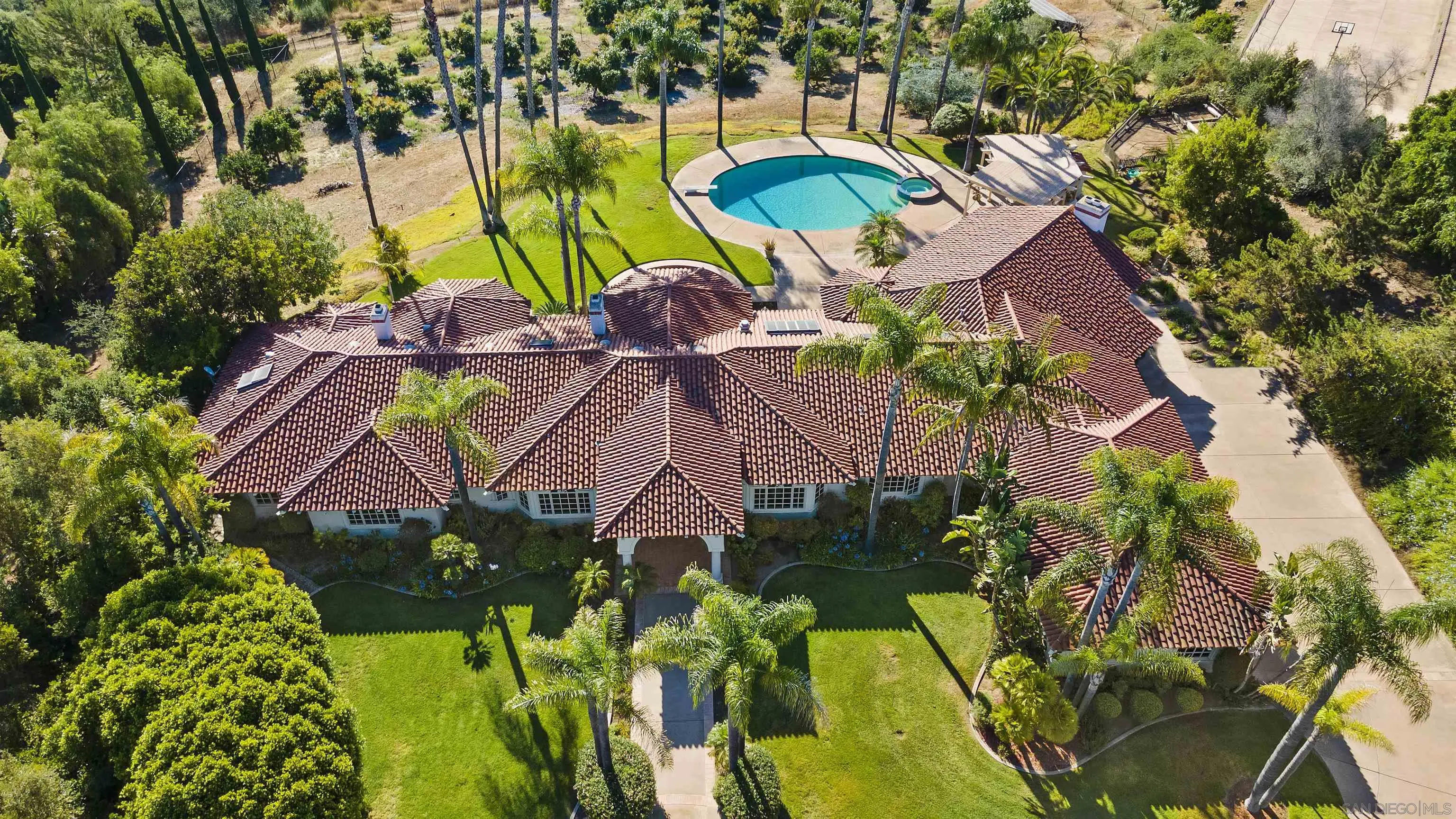 4 Rollingview Lane Fallbrook, CA 92028 - Photo 32 of 32 an aerial view of a house with swimming pool and ocean view