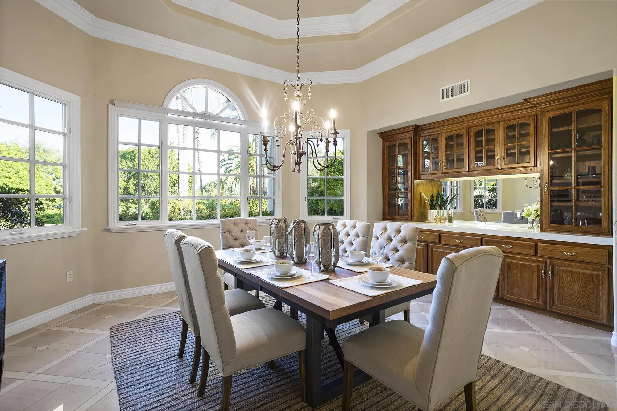 4 Rollingview Lane Fallbrook, CA 92028 - Photo 6 of 32 a view of a dining room with furniture a chandelier and wooden floor