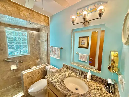 an aerial view of residential houses with outdoor space and garden