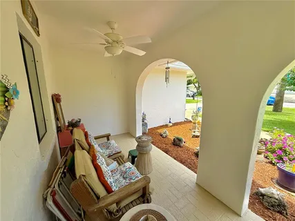 a kitchen with stainless steel appliances granite countertop a sink and a refrigerator