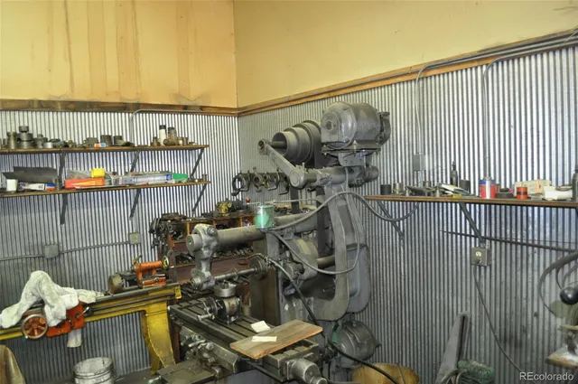 a view of a balcony with furniture