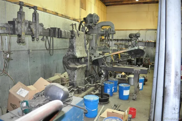 a bathroom with a sink mirror and vanity