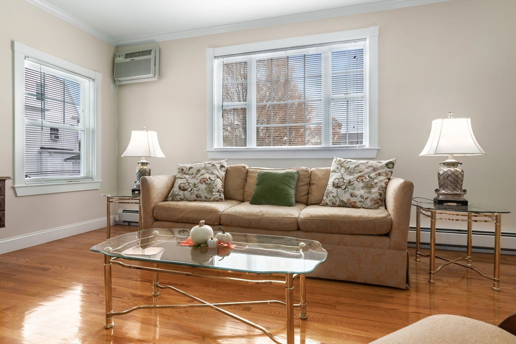 20 Ash Street, Unit 1 Danvers, MA 01923 - Photo 11 of 42 a living room with furniture and a window