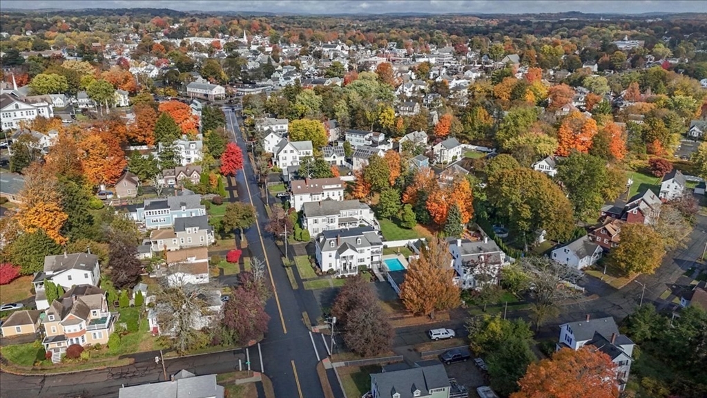 20 Ash Street, Unit 1 Danvers, MA 01923 - Photo 39 of 42 an aerial view of residential houses with outdoor space