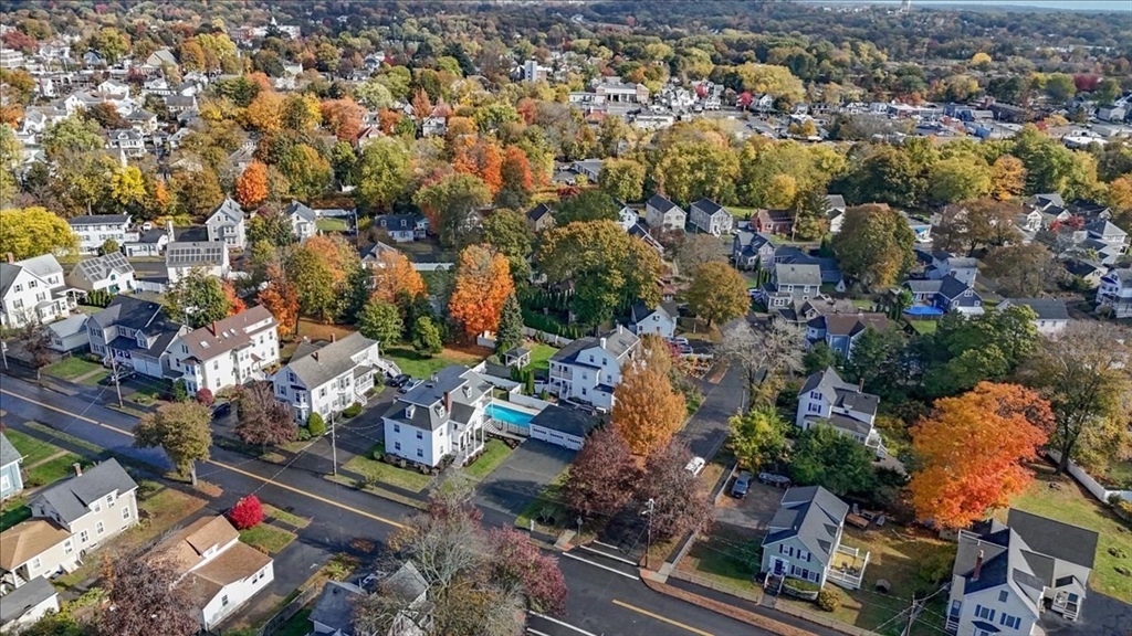 20 Ash Street, Unit 1 Danvers, MA 01923 - Photo 40 of 42 an aerial view of residential houses with outdoor space