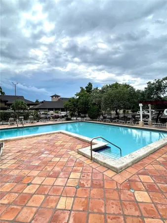 a view of a backyard with a patio