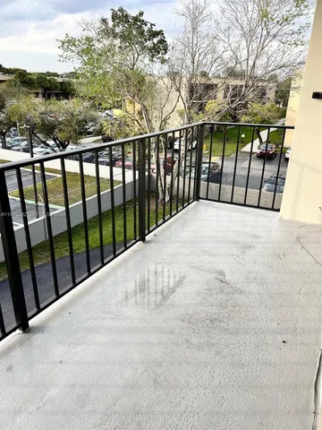 a view of a city street from a terrace