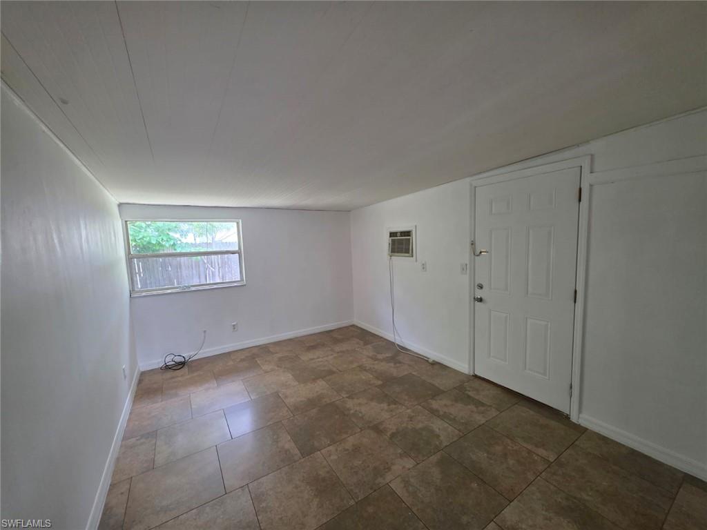 2103 Unity Avenue Fort Myers, FL 33901 - Photo 13 of 40 a view of an empty room and a window