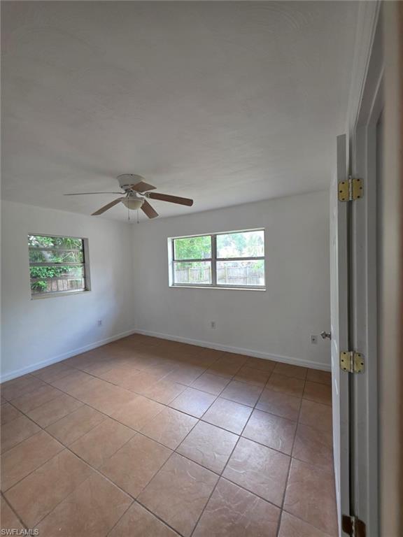 2103 Unity Avenue Fort Myers, FL 33901 - Photo 18 of 40 an empty room with windows