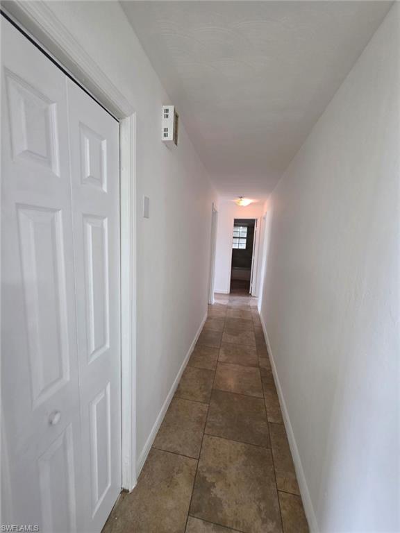 2103 Unity Avenue Fort Myers, FL 33901 - Photo 20 of 40 a view of a hallway with wooden floor