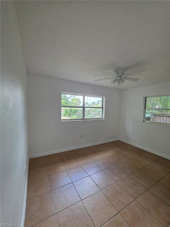 2103 Unity Avenue Fort Myers, FL 33901 - Photo 23 of 40 an empty room with windows