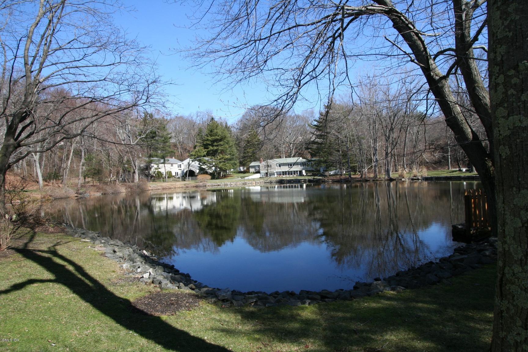 13 Georgetowne North, Unit 13 Greenwich, CT 06831 - Photo 15 of 17 a view of lake with green space
