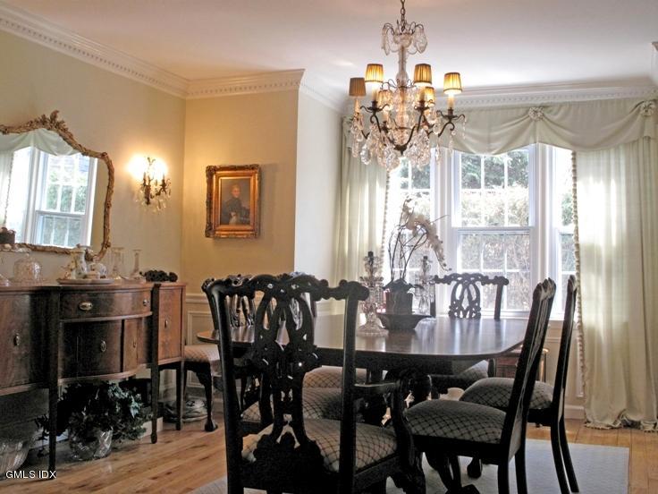 13 Georgetowne North, Unit 13 Greenwich, CT 06831 - Photo 5 of 17 a view of a dining room with furniture and wooden floor
