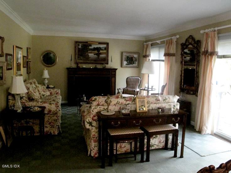 13 Georgetowne North, Unit 13 Greenwich, CT 06831 - Photo 7 of 17 a view of a dining room with furniture and window