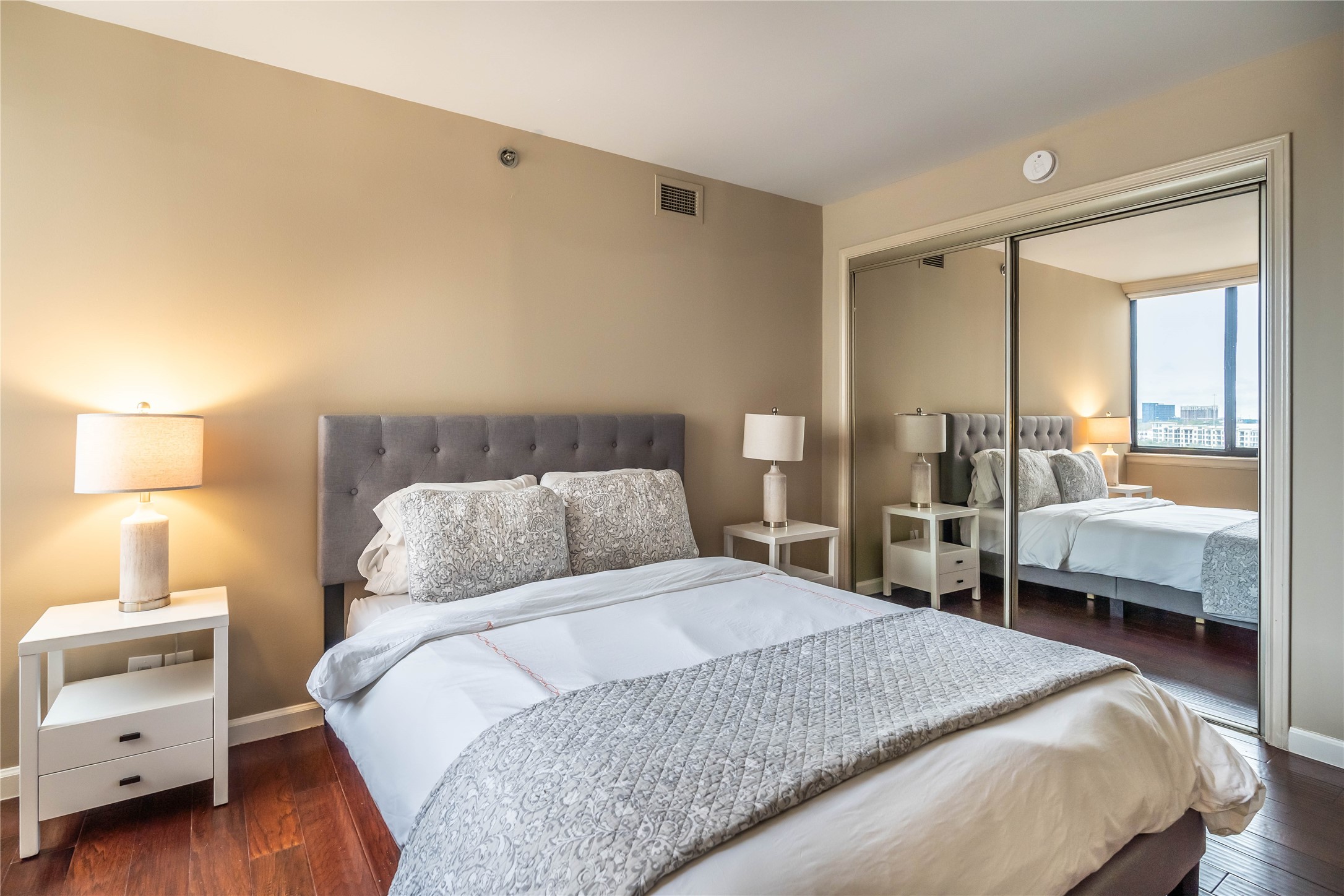 3525 Sage Road, Unit 1009 Houston, TX 77056 - Photo 15 of 23 a bedroom with a bed and a view of bedroom